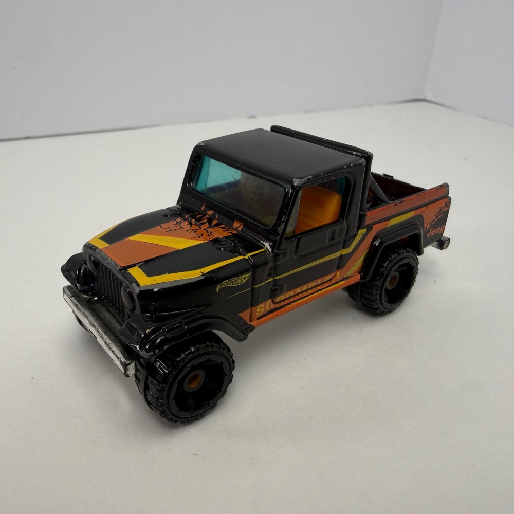 Hot Wheels Jeep Scrambler Black Orange Yellow Stripe Diecast Truck 1:64 G33 2012